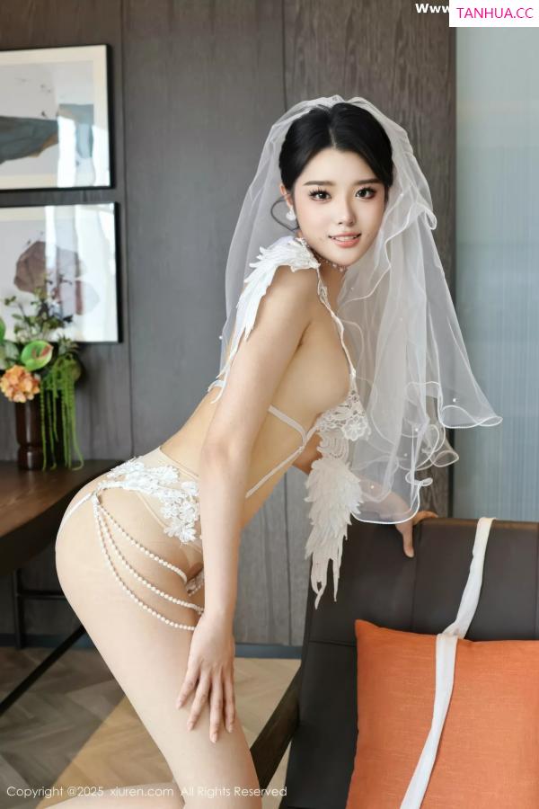   [XiuRen]高清写真图 2025.07.18 No.10559 糯梨子 白色婚纱第33张图片